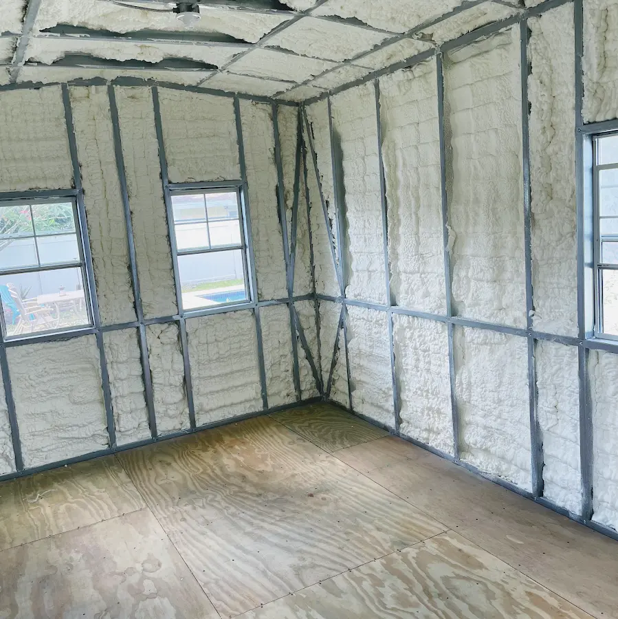 Closed-cell spray foam insulation applied to wall cavities in a residential project in Olmsted Falls